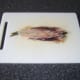 Herring is halved and the innards are removed