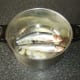 Herring and seasonings are placed in large pot
