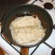 Pan frying the oatmealed herring fillets