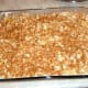 Cover the noodles evenly with the Ritz topping.