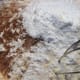 Whisking the dry ingredients together - flour, baking powder, salt and cinnamon. Don't forget to add the lemon zest like I did!