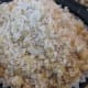 Crunchy topping pressed into the tops of the strawberry muffins before baking.