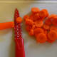 Cut the carrots into 1/4" thick coins.