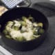 After cooking to desired consistency, drain and put back into the saucepan. Add cheese, salt, pepper and optional butter and cover to it will all melt. Then serve.