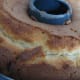 The warm lemon cake, before turning out onto a cake rack.