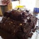 You can add in pieces of the cake that were cut off to fill gaps and to shape the mountain.