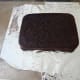 Put aluminum foil under the bottom layer of the cake.
