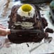 Cut and shave the cake to form the volcano.