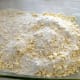 Remove 1/2 cup of crumb mixture. Divide remaining crumb mix in half and place half in the bottom of pan.