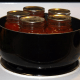 Stewed tomatoes processing in the pan of boiling water.