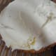 Spread buttercream icing over the other half of the cake