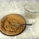 Spreading the mixture into the pie pan.