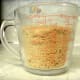 Don't compact the crackers when measuring, but leave them loose. 1 1/2 cups.