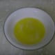 6 tablespoons of butter, melted. Be careful it isn't so hot as to burn when it is time to press into the pan.