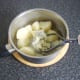 Cooked potatoes are mashed with a little milk and butter