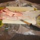 Third fillet is removed from the ling