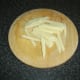 Potato is peeled, sliced and chopped in to fries