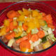 Throw all of your veg in on top of the sausages
