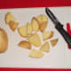 Whilst the sausages are cooking, prepare your veg. Cut up your potatoes into reasonable chunks. No need to peel!