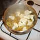 Cucumber is added to the chicken mix