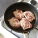 Browning chicken thighs in oil