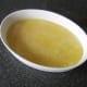 Rice and stock is added to casserole dish