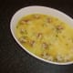 Chicken stock is poured over rice combination