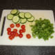 Garnishings are prepared for biryani chicken and rice casserole