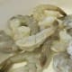 Peeled and cleaned jumbo shrimp is ready for seasoning.