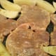 Seasoned chops and potatoes ready to roast