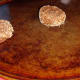 Place on a greased cookie sheet, sugar side up.