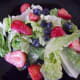 Plate the salad.