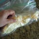 Squish butter and cheese together with your fingers.