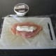 Spoon mascarpone cheese onto chicken breast