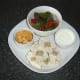 Add sliced stuffed chicken to the plate for service