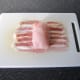 Prepare to roll stuffed chicken breast in pancetta