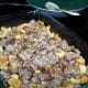 Top with sausage.