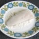 Pollack is patted in seasoned flour on its skin side