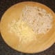 Grated cheddar cheese and breadcrumbs