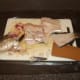 Pollack carcass is chopped in to large pieces