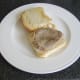 Steak is laid on base of bread roll