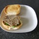 Steak is added to roll