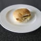 Assembled steak cheeseburger with spicy tomato relish
