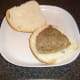 Rested steak is laid on bread roll