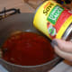 Add the tomato sauce to the oil.