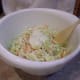 Shred your veggies and add in your coleslaw dressing.