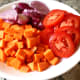Cut and dice the vegetables.
