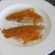 Curry rub is applied to sea bream fillets