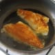 Sea bream fillets are fried firstly on their skin sides