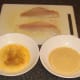 Preparing sea bream fillets for pan frying in breadcrumbs